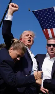 Er Doctor Confirms Brain-Matter On Bleachers | President Trump Shot In Head By Antifa Shooter At Pennsylvania Rally Trump raises fist after trump assassination attempt