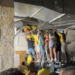 Copa america fans climb