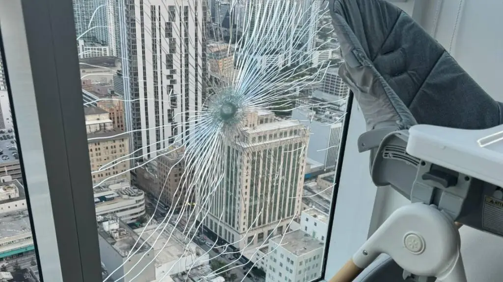 Miami Shooter Hits Multiple Condos, Even Baby'S High Chair Window shot miami news miami,miami shooter